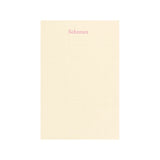 Beige notebook with 'Schemes' text on a white background