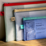 red yellow aqua pencil cases