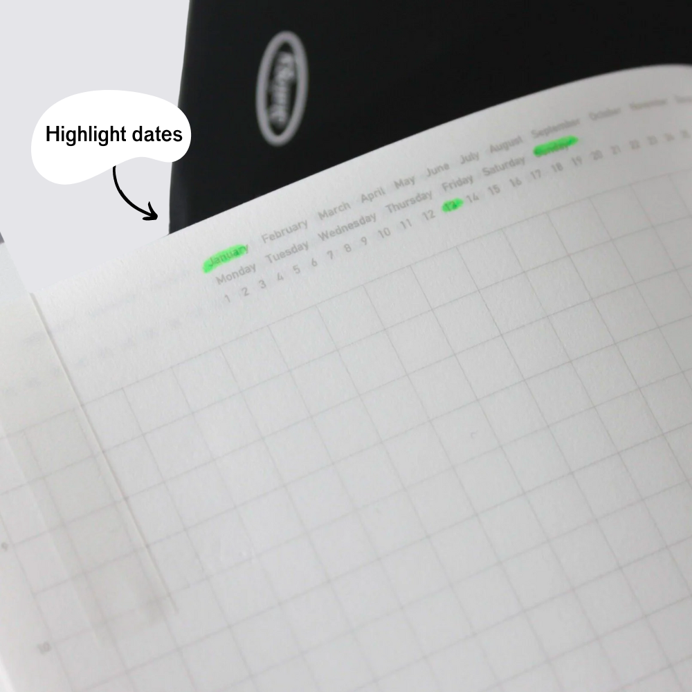 dated red grid notebook